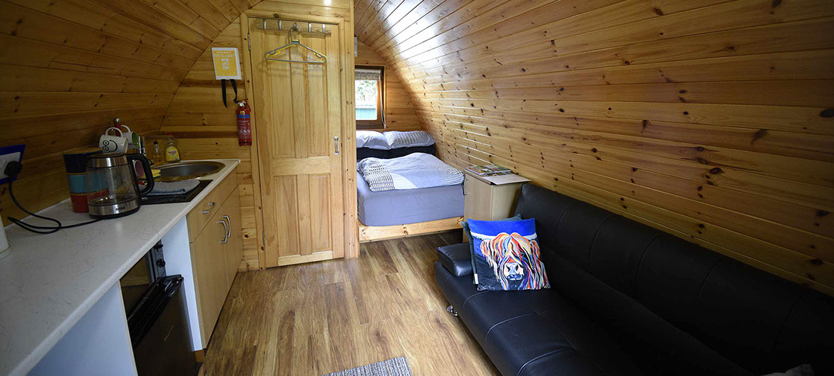Dunvegan Camping Pods contain comfortable double bed great couch and en suite shower room