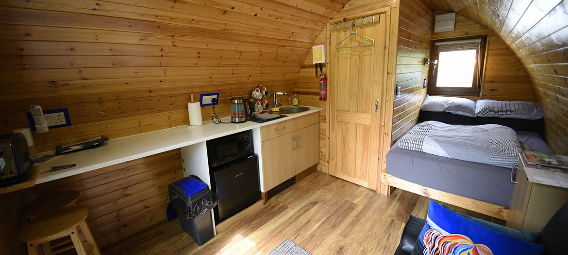 Our self catering Pods offer modern facilities including double bed with all bedding and linen provided