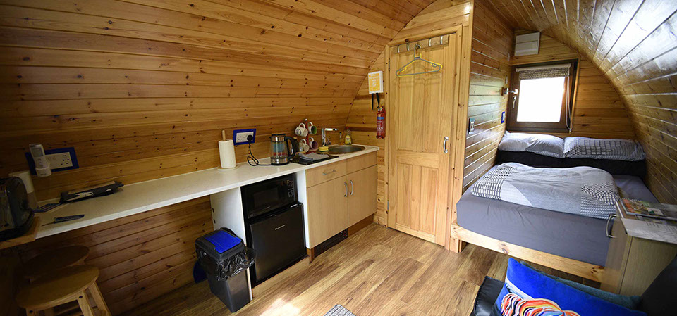 Our self catering Pods offer modern facilities including double bed with all bedding and linen provided