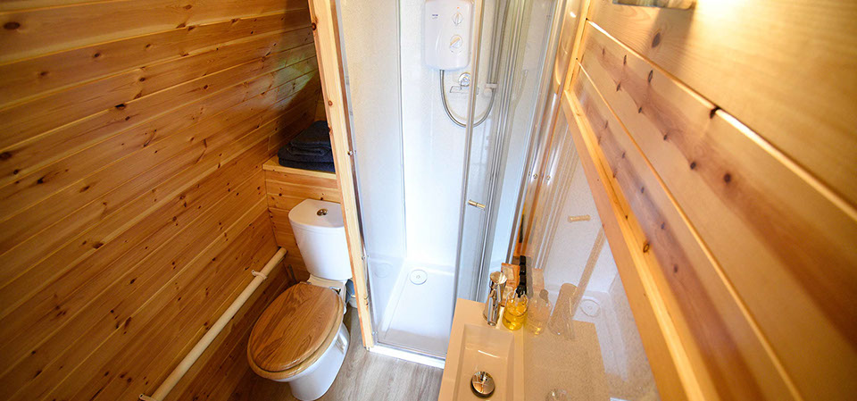 Self catering accommodation Pods in Dunvegan contain en suite shower rooms with powerful electric showers